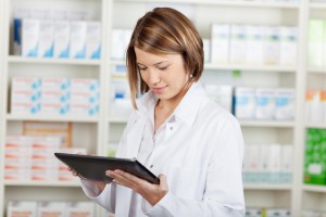 Pharmacist working with a tablet-pc